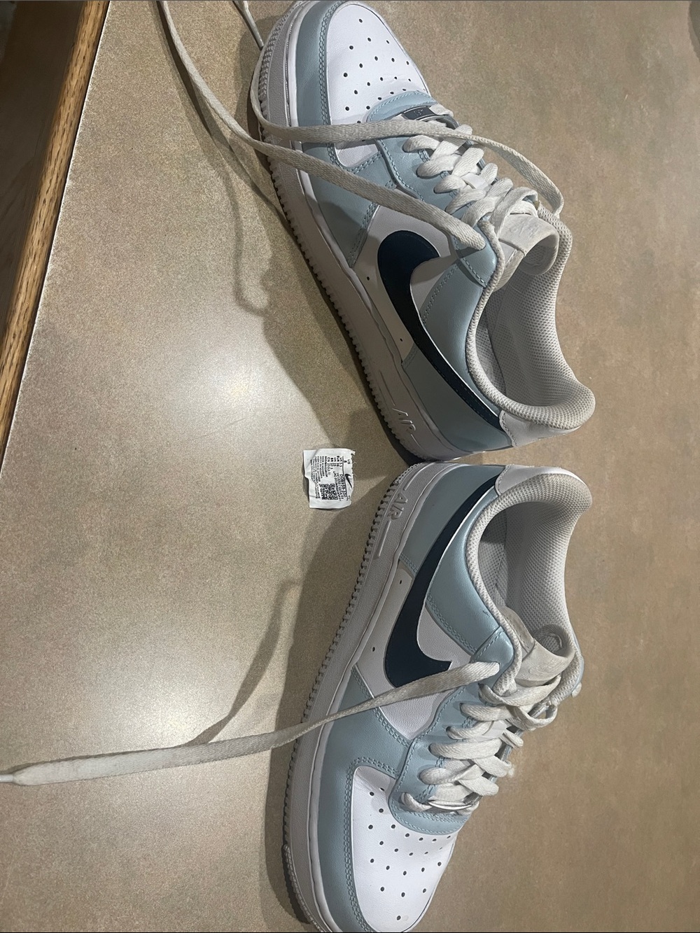 Adults Nike Low-Top Athletic Sneakers in White and Light Blue